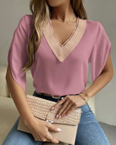 V-ringad temperament kortärmad enfärgad skjorta